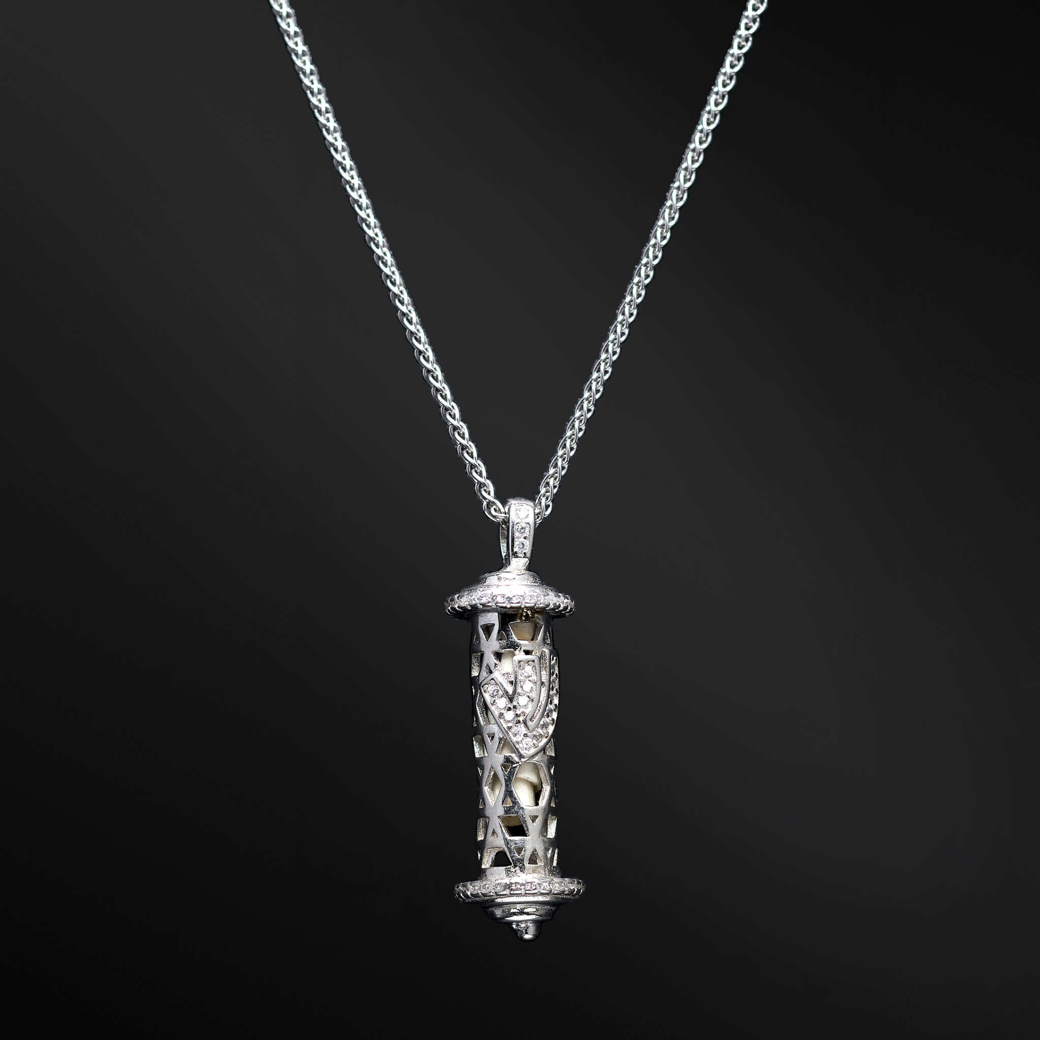 "Mazal Pendant: Embrace the power of destiny and guidance with the Mazal pendant. Allow the concealed Petek to illuminate your path, bringing a profound sense of purpose and meaning to your life."