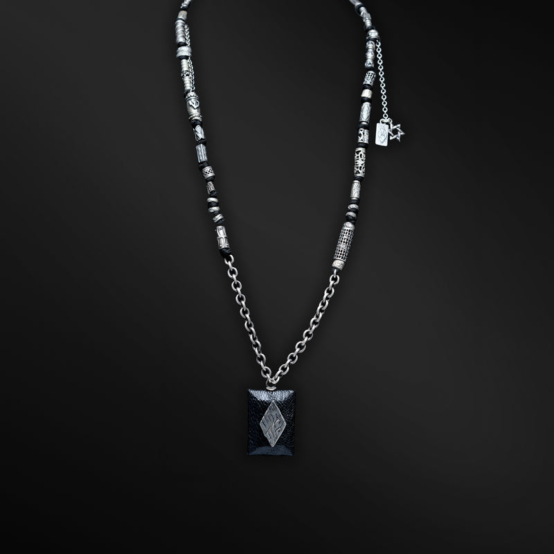 Adam Petek Leather ostrich skin