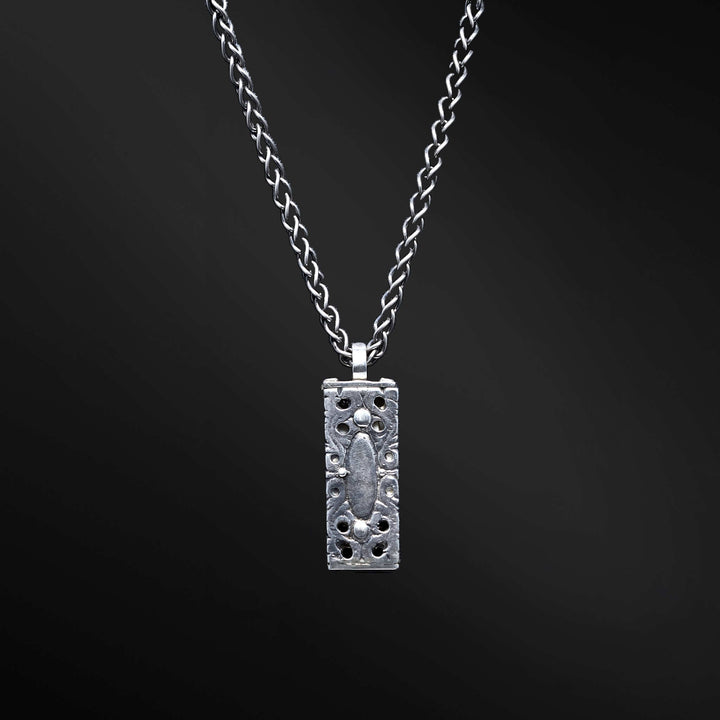 "ARI Pendant: Embrace the essence of the Ari pendant, a truly remarkable accessory. Its captivating design conceals a hidden wisdom that adds depth and meaning to your personal style, making a profound statement about who you are."