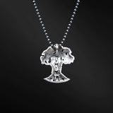 "HaEts Cheli Necklace: A photograph showcasing the exquisite HaEts Cheli necklace. The pendant features a captivating tree design with the Hebrew phrase 'HaEsh Cheli' delicately engraved. The photo captures the beauty of the necklace's intricate details, highlighting its symbolic representation of rootedness, strength, and the connection to nature."