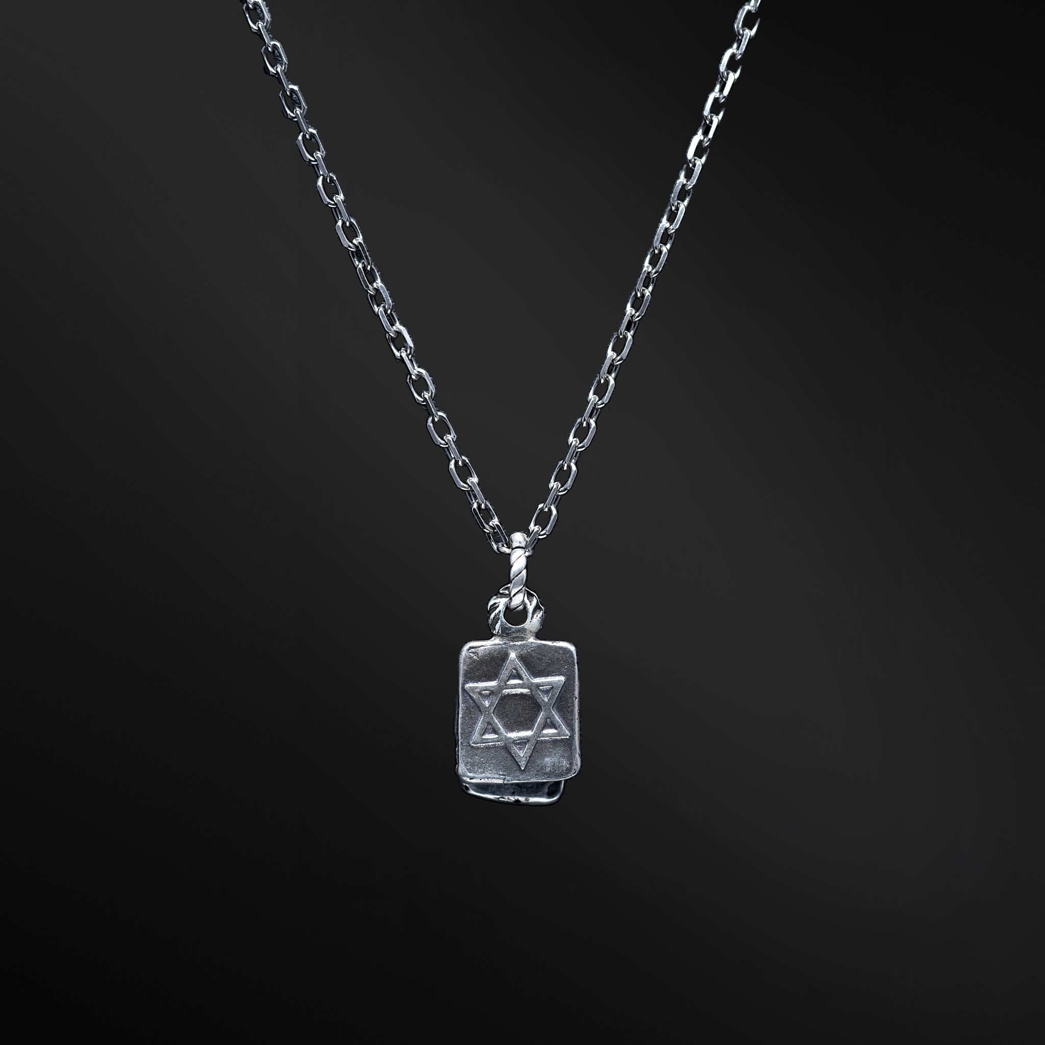 &quot;Aley Pendant: An image showcasing the captivating Aley pendant. The pendant exhibits two optional plaques with the Hebrew letters Alef and Yud, as well as a beautifully crafted Magen David (Star of David). The photo highlights the intricate details and elegance of the pendant, offering a glimpse of its personalized expression and symbolic representation. A visual testament to the wearer&