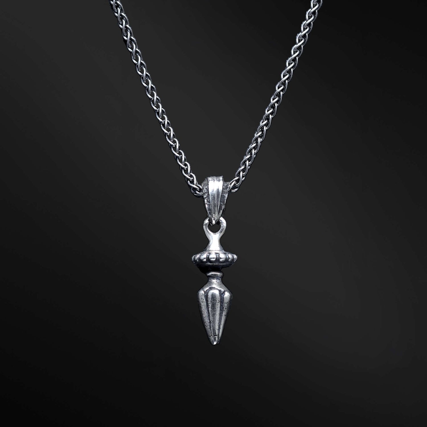 &quot;David Sword Pendant: An image capturing the embodiment of inner strength in the David Sword pendant. Crafted with finesse, this sleek pendant takes the form of a powerful sword. Its elegant design beautifully encapsulates the essence of courage and determination. When worn, it serves as a symbolic reminder of resilience and fearlessness, inspiring you to confront challenges head-on. Let this pendant empower and embolden your spirit.&quot;