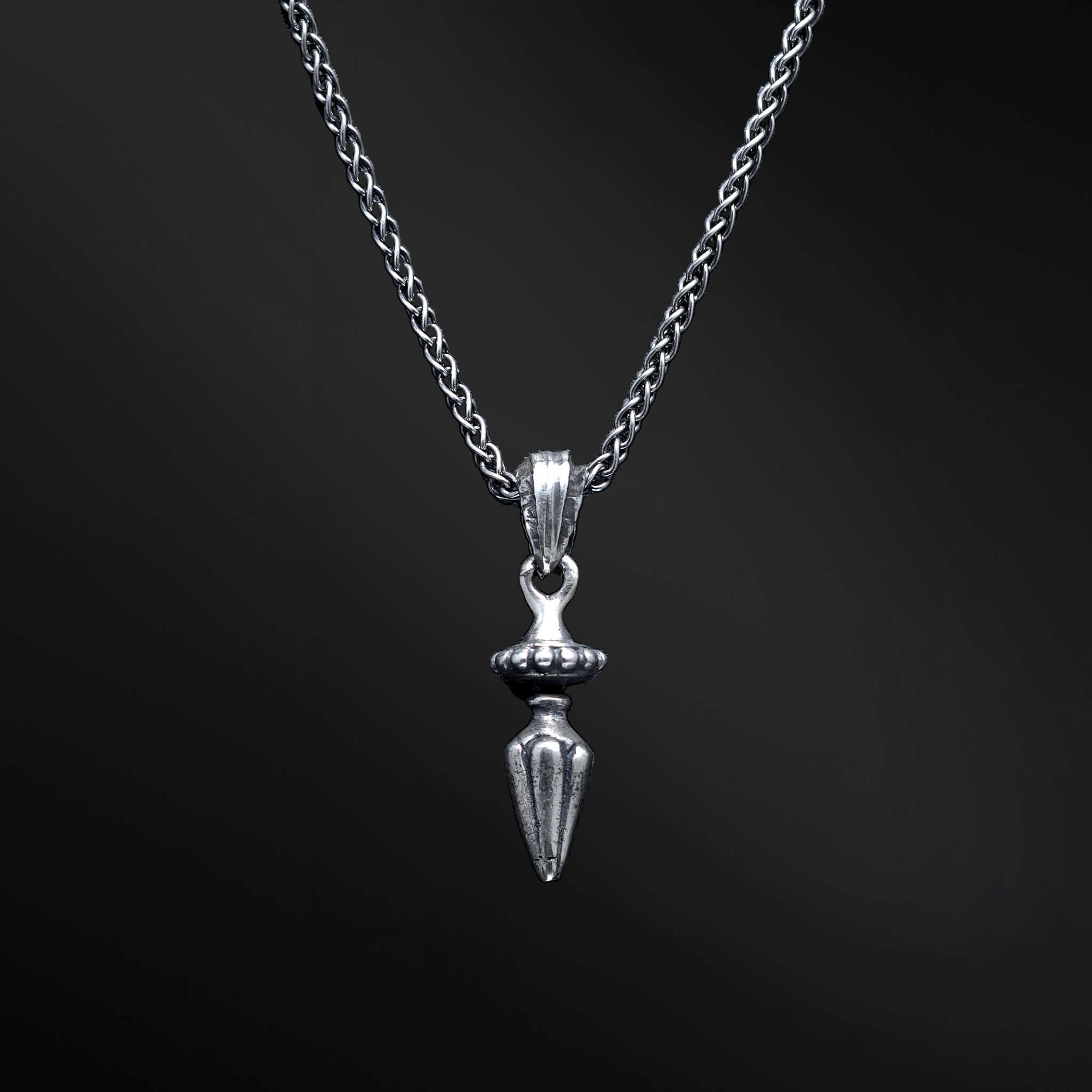 &quot;David Sword Pendant: An image capturing the embodiment of inner strength in the David Sword pendant. Crafted with finesse, this sleek pendant takes the form of a powerful sword. Its elegant design beautifully encapsulates the essence of courage and determination. When worn, it serves as a symbolic reminder of resilience and fearlessness, inspiring you to confront challenges head-on. Let this pendant empower and embolden your spirit.&quot;