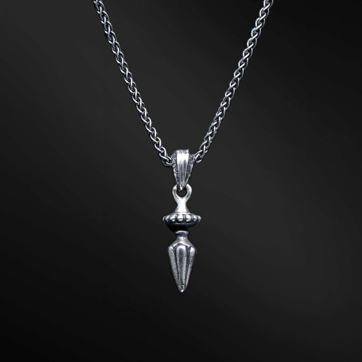 "David Sword Pendant: An image capturing the embodiment of inner strength in the David Sword pendant. Crafted with finesse, this sleek pendant takes the form of a powerful sword. Its elegant design beautifully encapsulates the essence of courage and determination. When worn, it serves as a symbolic reminder of resilience and fearlessness, inspiring you to confront challenges head-on. Let this pendant empower and embolden your spirit."