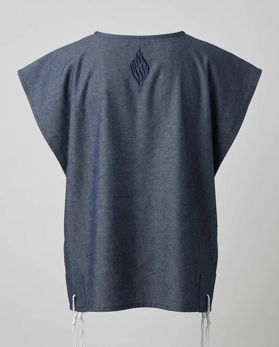 Tallit katan in denim, back view with Aesh Sheli flame embroidery, handmade in Israel, Kameart